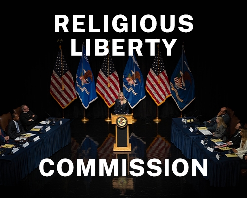Religious Liberty Commission text with Attorney General Pamela Bondi at podium during hearing with commission members